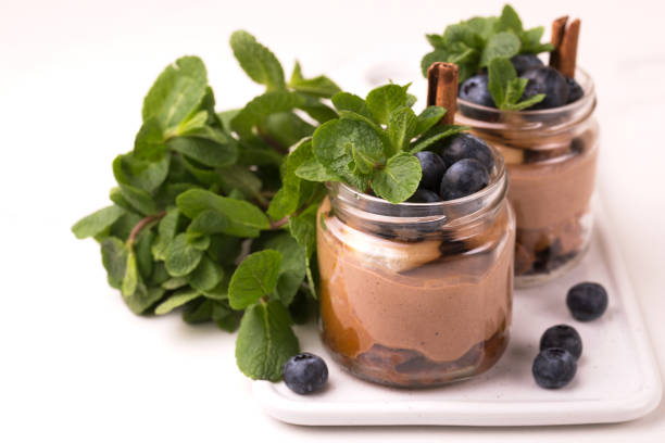 istock Cake dessert. Chocolate mousse with blueberry, mint and cinnamon 1139987438