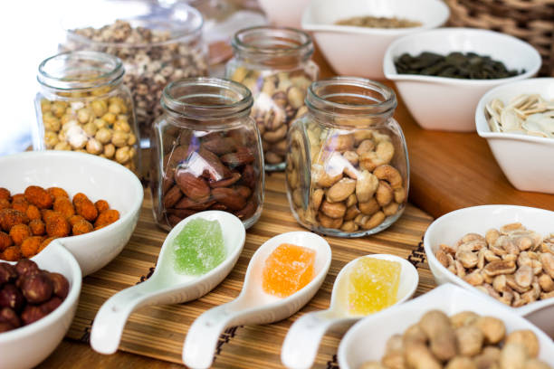 istock Various piles of mixed gummy candy and nuts 1139987563