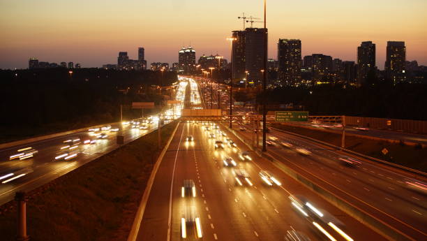 istock 401 Highway with Toronto city 1139991723