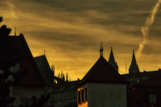 Prague, Czech Republic March 31 2019,building  silhouette over golden sky