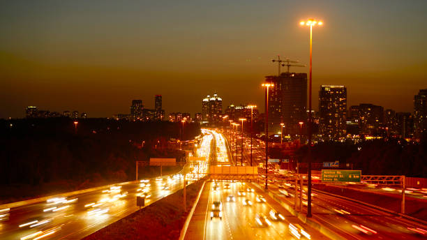 istock 401 Highway with Toronto city 1139991804