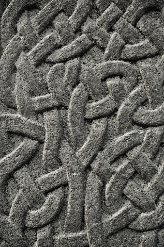 Abstract Background Detail Of A Celtic Knot Pattern In Stone