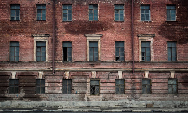 istock The wall with windows of the abandoned building 1139993901