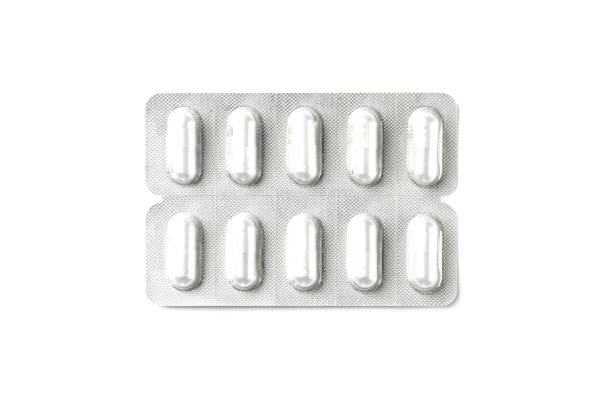 Packaging of medical capsules Packaging of medical capsules isolated on white background. tablets blister stock pictures, royalty-free photos & images