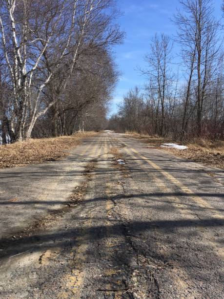 istock Old Canadian highway with shadows 1139996317