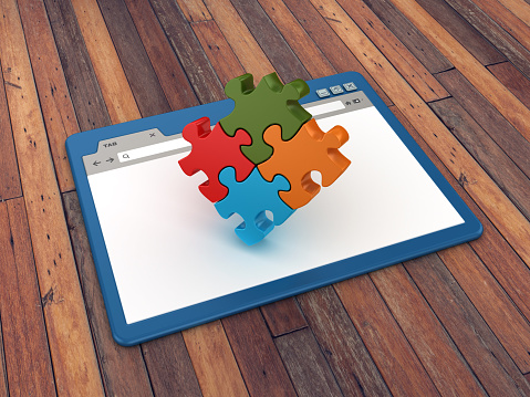 Web Browser with Jigsaw Puzzle on Wood Floor Background  - 3D Rendering