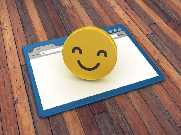 istock Web Browser with Smile Emoticon on Wood Floor Background  - 3D Rendering 1139998307