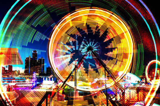 Midway Rides Long Exposure - Abstract A long exposure abstract of midway rides on the Windsor riverfront looking towards Detroit Michigan. detroit michigan photos stock pictures, royalty-free photos & images