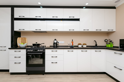 Modern spacioius black and white kitchen, clean design