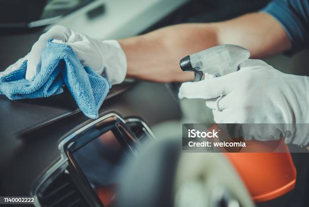 Worker Cleaning Car Dashboard Stock Photo - Download Image Now - Cleaning, Car, Car Wash