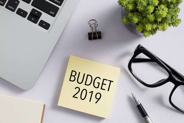 istock Top view of office desktop with Budget 2019 Concept 1140005527