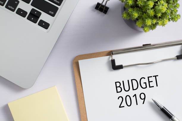 istock Top view of office desktop with Budget 2019 Concept 1140005533