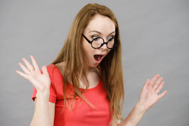 istock Shocked woman wearing nerd glasses 1140011415