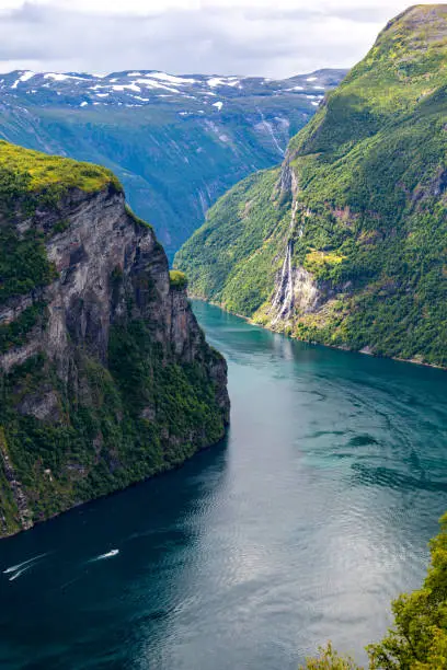 Breathtaking view on Geirangerfjord fjord and the Seven Sisters waterfall, Norway.