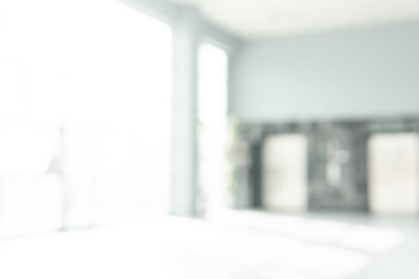 istock Abstract blurred white doctor medical office room background concept for blur empty space grey modern hospital clinic pharmacy, light clean interior retail sale, blue glare window hallway building 1140015409