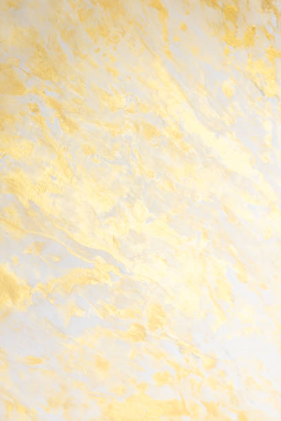Abstract golden textured hand painted background closeup