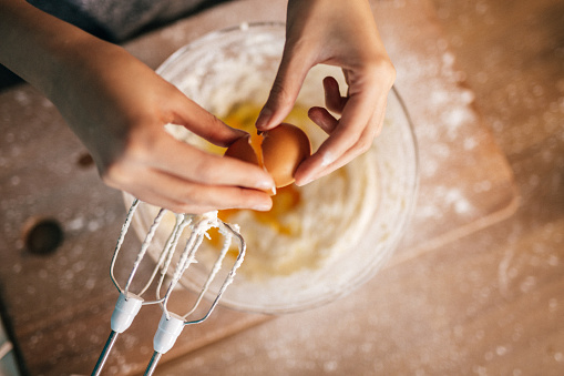Woman making cupcakes