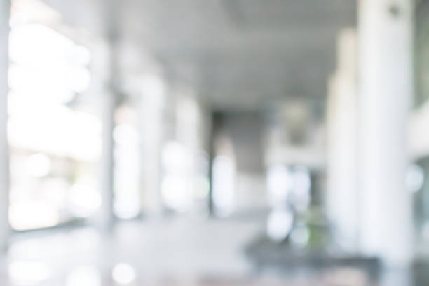 business building, university or hospital blur background office lobby hall and corridor interior view of white room with blurry light from corridor glass window wall - building interior fotos imagens e fotografias de stock