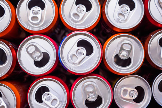 istock Empty aluminium drink cans recycling background concept, top view closeup 1140020649