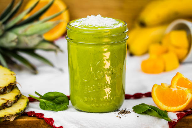 Delicious Vegan Tropical Smoothie This delicious & sweet smoothie was made for those who want to stay hydrated and healthy. Prepared by famous chef BVGAN. kruis stock pictures, royalty-free photos & images