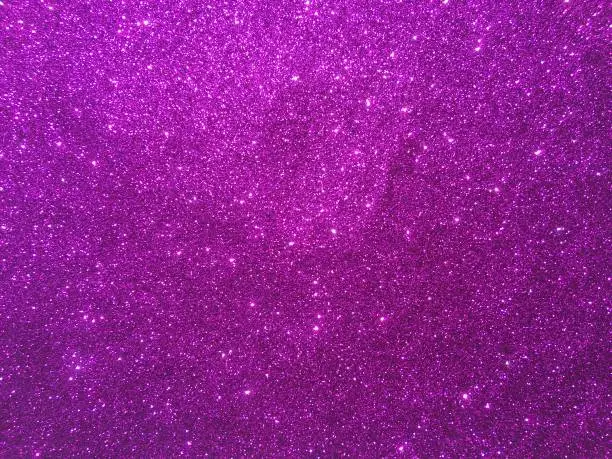 Photo of magenta glitter background