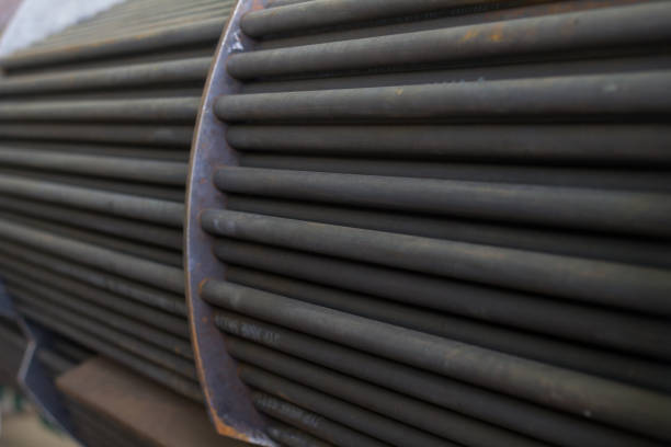 Steel tubes of the heat exchanger, the water heater in the boiler as background Steel tubes of the heat exchanger, the water heater in the boiler as background firebox steam engine part stock pictures, royalty-free photos & images
