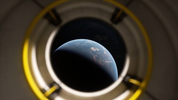 istock looking at earth from a spaceship window. 1140033226