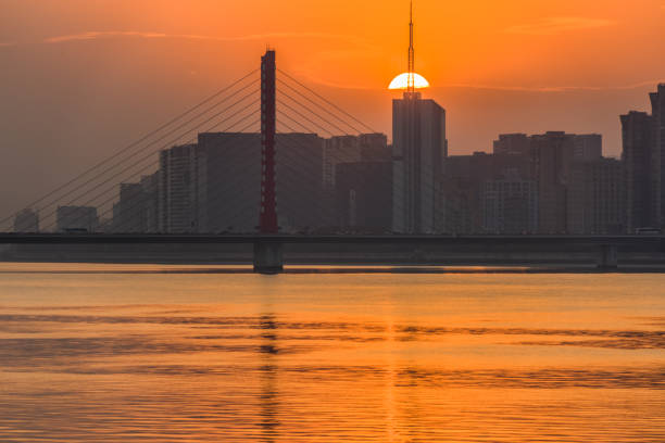istock Bay Bridge over sunrise in hangzhou, china 1140033266