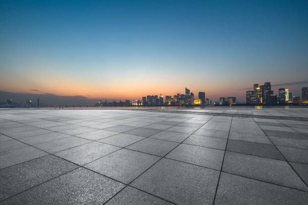 istock Panoramic skyline and buildings with empty square floor at dusk 1140033317