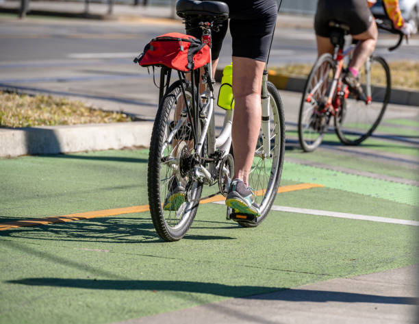 istock Enthusiasts ride bicycles one after another along the cycle path 1140034420