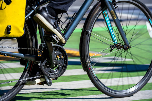 istock Cyclist pedaling on bicycle and rides on bike path 1140035377