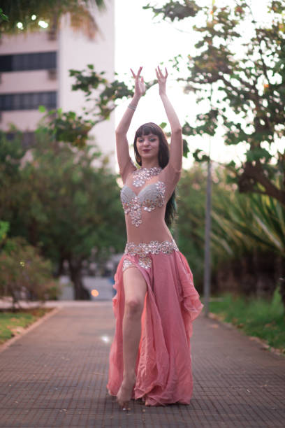 istock A pretty belly dancer in the park 1140035619