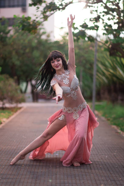 istock A pretty belly dancer in the park 1140035668
