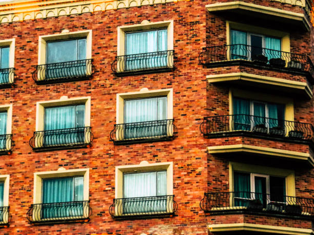 istock Windows and balconies in building facade 1140039799