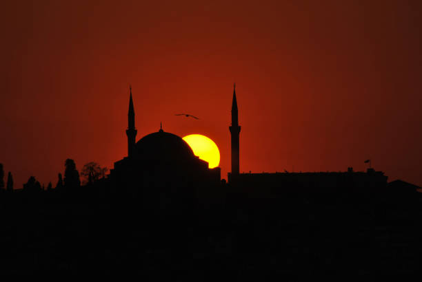 istock Silhouette of mosque at sunset 1140049839