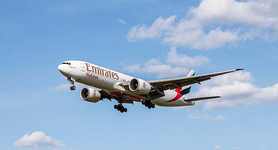 London - April 2015: Emirates Sky Cargo Plane on a Landing Approach at London Heathrow Airport
