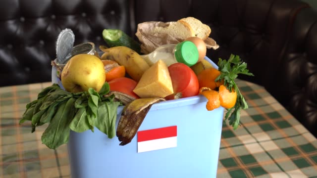 Food waste in Trash Bin. The problem of food waste in Indonesia