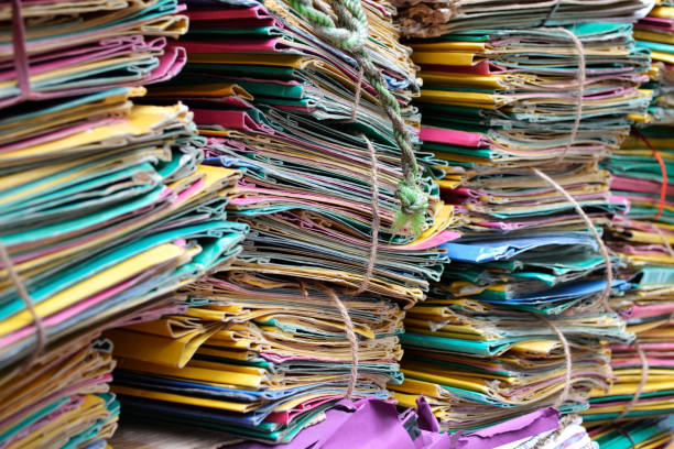 istock Files in different colors stacked up in office 1140052401