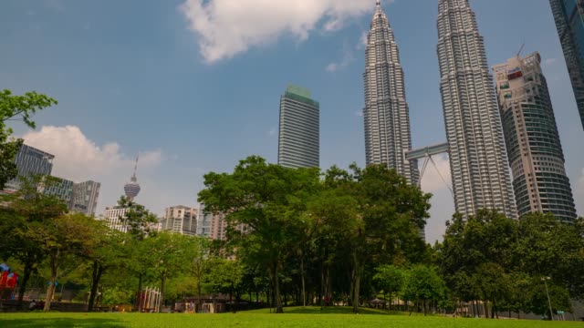 kuala lumpur sunny day famous city central park towers panorama 4k timelapse malaysia
