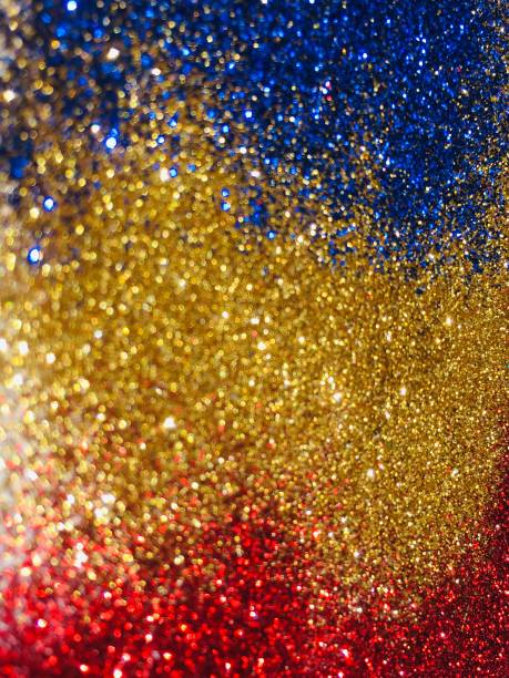 istock Glitter sparkle and texture abstract background gold blue red 1140056219