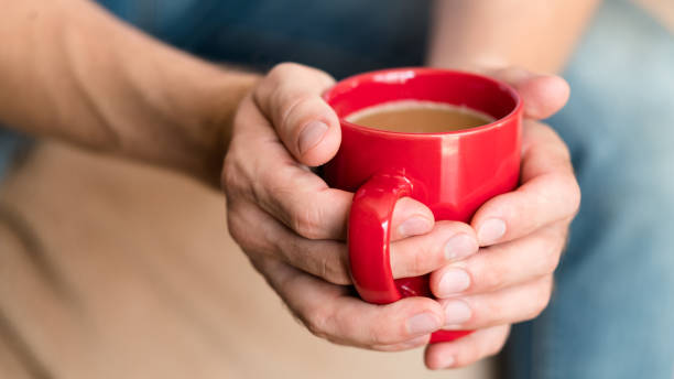 istock coffee relaxation enjoyment warmth man hands cup 1140058159