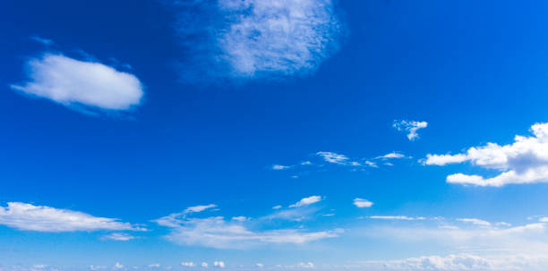 istock Bright blue sky with white varied clouds 1140062988