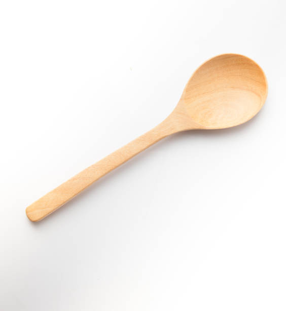 istock Top view of wooden spoon, white background. 1140067292
