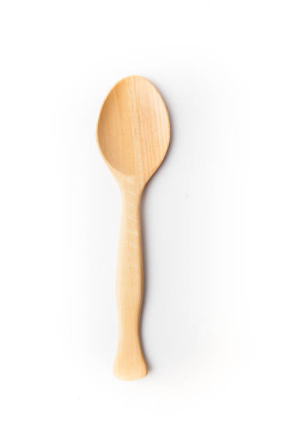 istock Top view of wooden spoon, white background. 1140067304