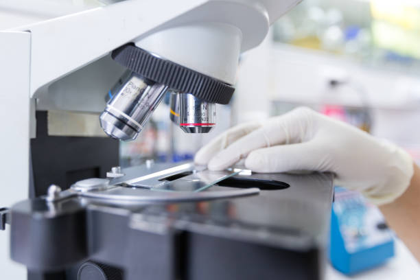 istock Close up of microscope at the blood laboratory, Concept Science and Technology 1140067450