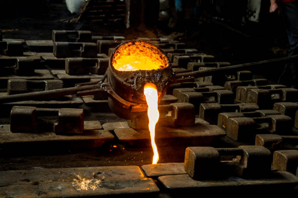 istock metal casting process with red high temperature fire in metal part factory 1140068895