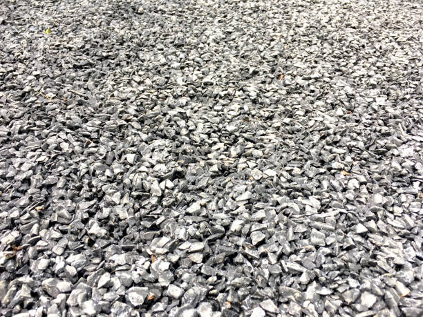 istock Rough black asphalt of road perspective view background 1140074125