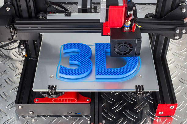 Red black 3D printer printing blue logo symbol on metal diamond plate future technology modern concept Red black 3D printer printing blue logo symbol on metal diamond plate future technology modern concept background printout stock pictures, royalty-free photos & images