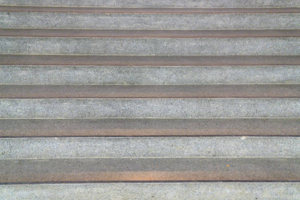 Background image of slightly blurry shot of a gray stone staircase