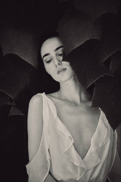 istock Woman Standing By Plants 1140077451